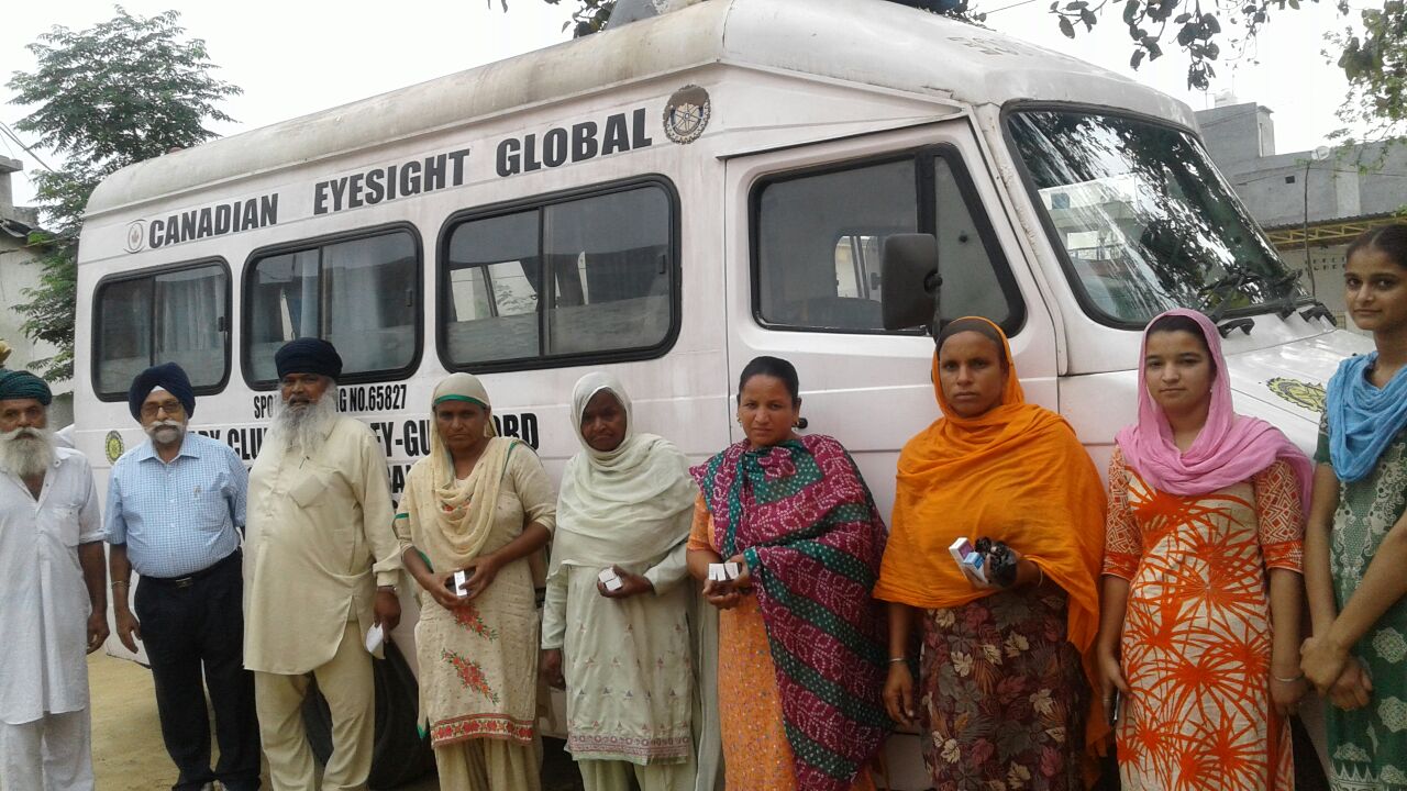 Patients outside the Canadian Eyesight Global eye camp van